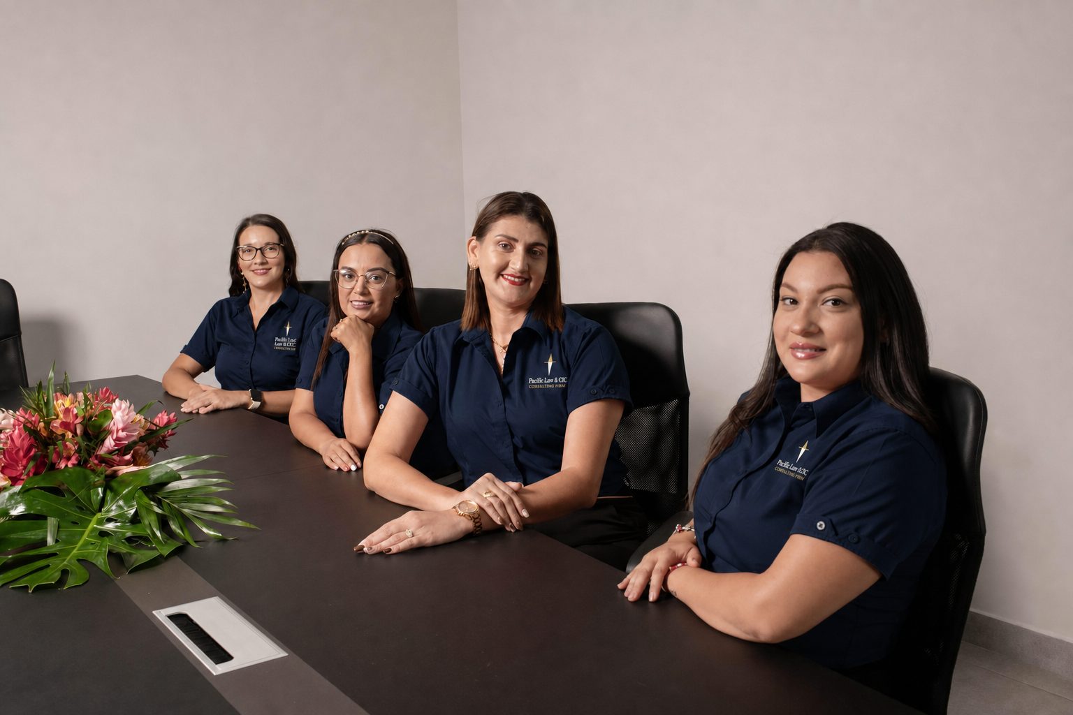 Four members of the Pacific Law & CIC team at the boardroom table